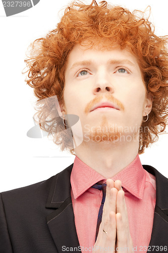 Image of praying businessman