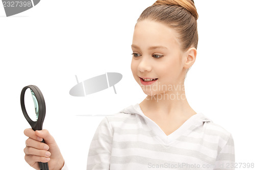 Image of teenage girl with magnifying glass