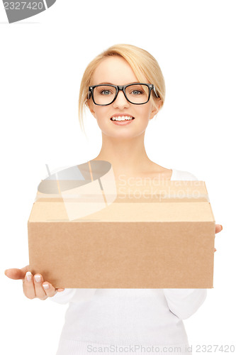 Image of attractive businesswoman with cardboard box