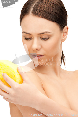 Image of beautiful woman with sponge