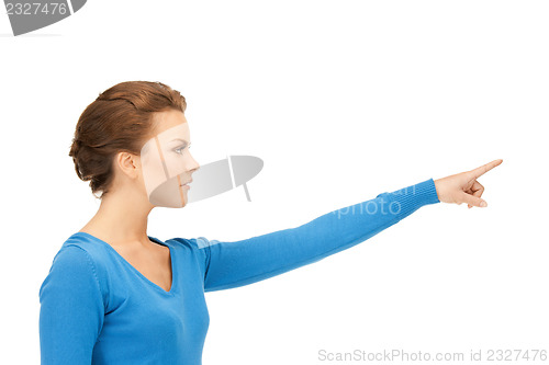 Image of businesswoman pointing her finger