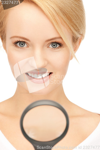 Image of woman with magnifying glass