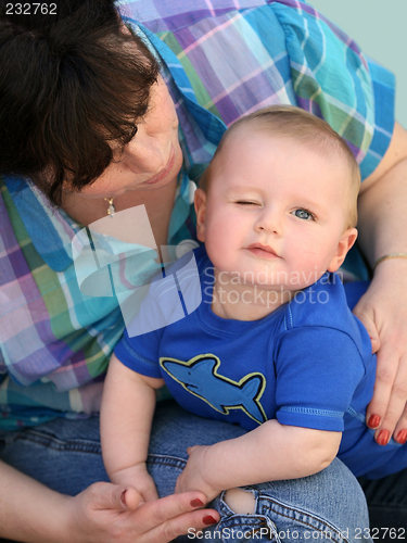 Image of Mother playing with her baby