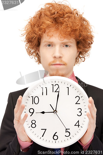 Image of man with clock