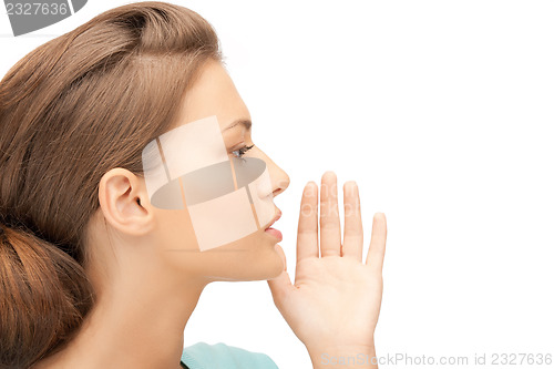 Image of woman whispering gossip