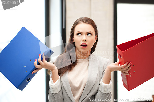 Image of woman with folders