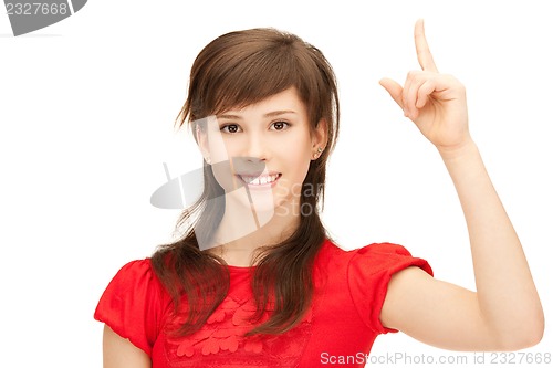 Image of teenage girl with her finger up