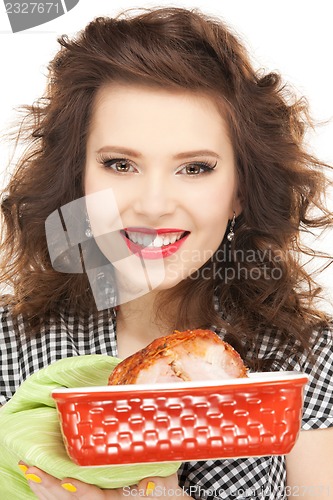 Image of lovely housewife with meat