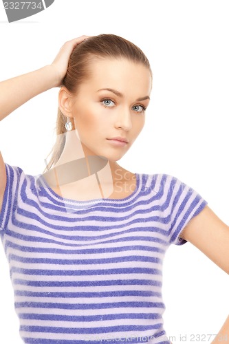 Image of lovely woman in striped sweater