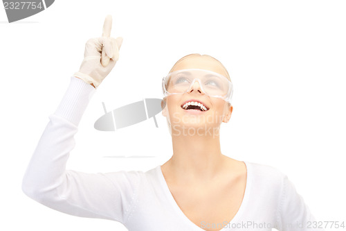 Image of woman in protective glasses and gloves