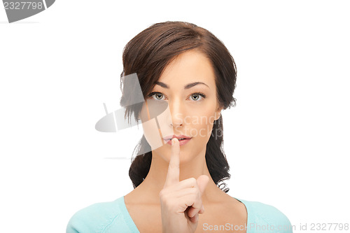 Image of finger on lips