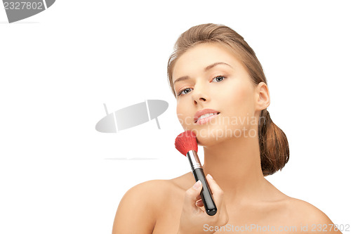 Image of beautiful woman with brush