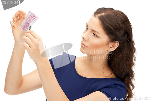 Image of lovely woman with euro cash money