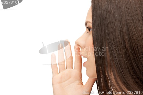 Image of woman whispering gossip