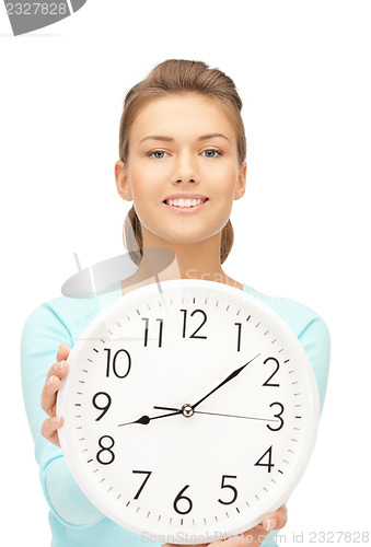 Image of woman holding big clock