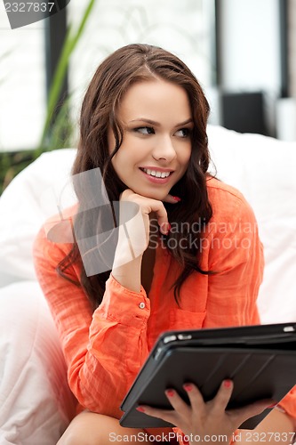 Image of happy woman with tablet pc computer