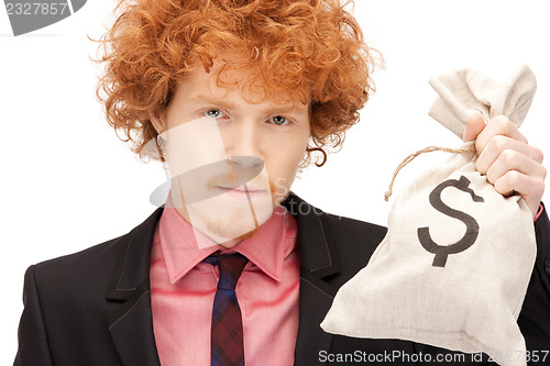 Image of man with dollar signed bag