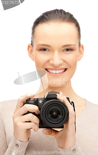 Image of teenage girl with digital camera