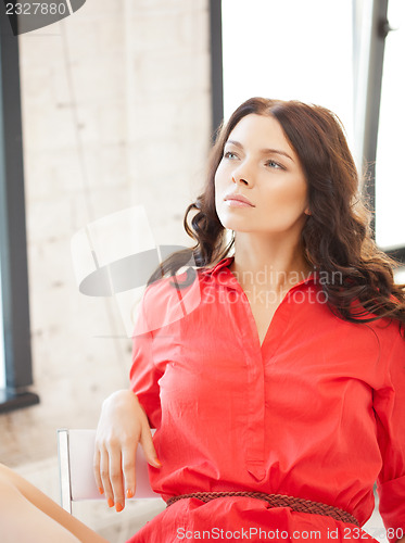 Image of calm and serious woman