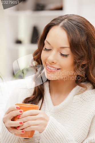 Image of lovely woman with mug