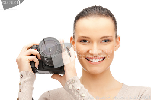 Image of teenage girl with digital camera