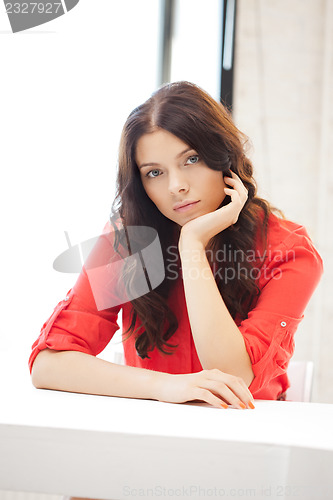 Image of calm and serious woman