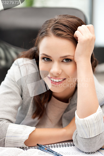 Image of happy woman with book