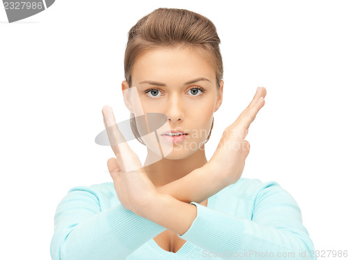 Image of woman making stop gesture