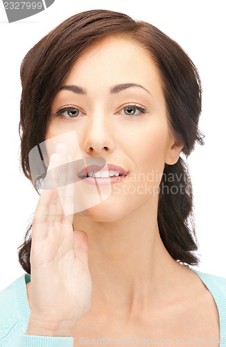 Image of woman whispering gossip