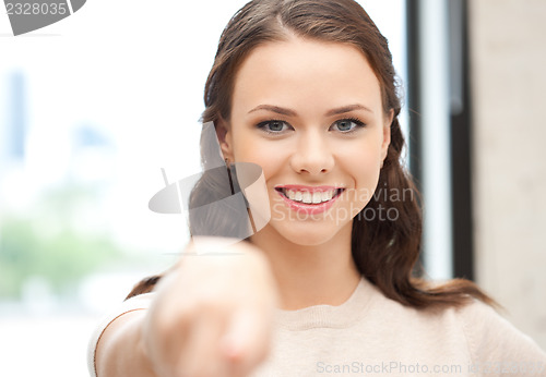 Image of businesswoman pointing her finger