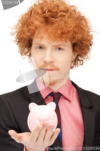 Image of man with piggy bank