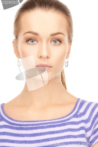 Image of lovely woman in striped sweater