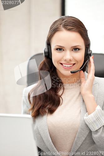 Image of helpline operator with laptop computer