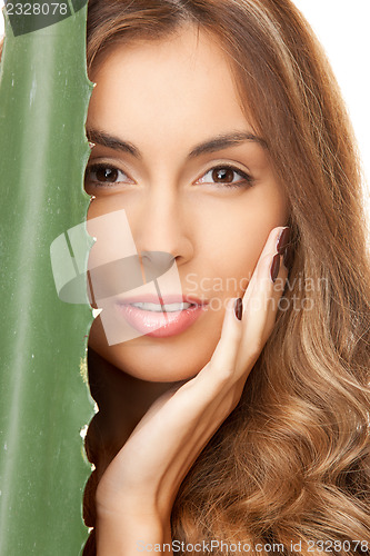 Image of lovely woman with aloe vera