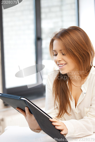 Image of happy woman with tablet pc computer