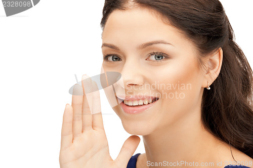 Image of woman whispering gossip