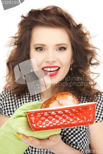 Image of lovely housewife with meat