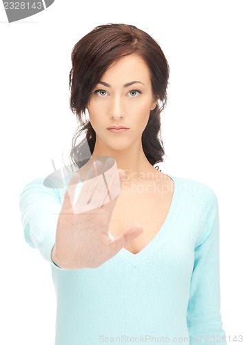 Image of woman making stop gesture