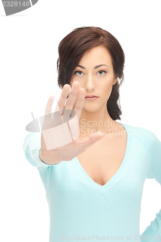 Image of woman making stop gesture