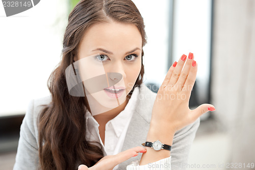 Image of businesswoman with watch