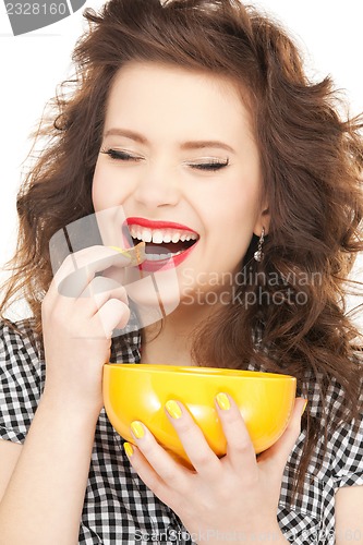 Image of lovely housewife with cup