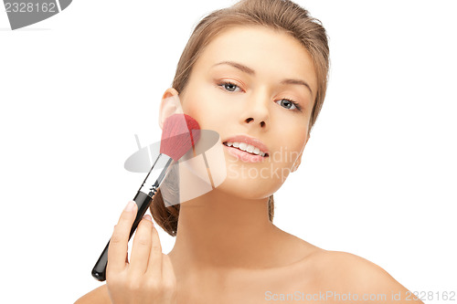 Image of beautiful woman with brush