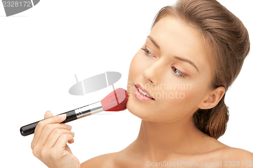 Image of beautiful woman with brush
