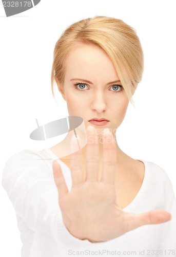 Image of woman making stop gesture