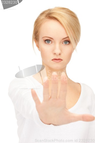 Image of woman making stop gesture