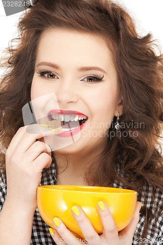 Image of lovely housewife with cup