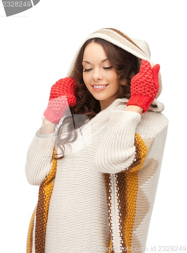 Image of beautiful woman in white sweater