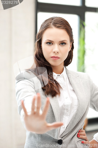 Image of woman making stop gesture