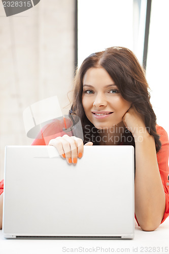 Image of happy woman with laptop computer