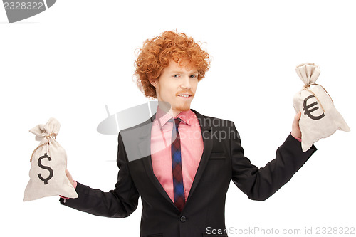 Image of man with euro and dollar bags